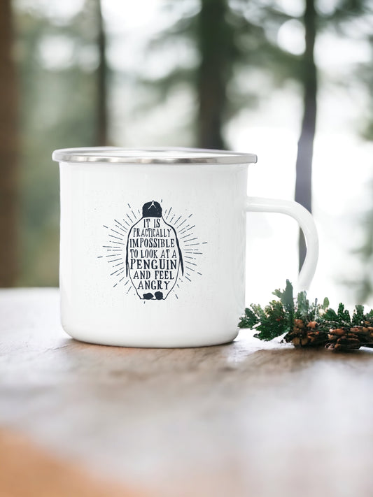 It is practically impossible to look at a penguin and feel angry - Enamel Mug